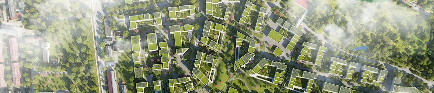 Luftfoto av et bærekraftig samfunn med grønne tak.